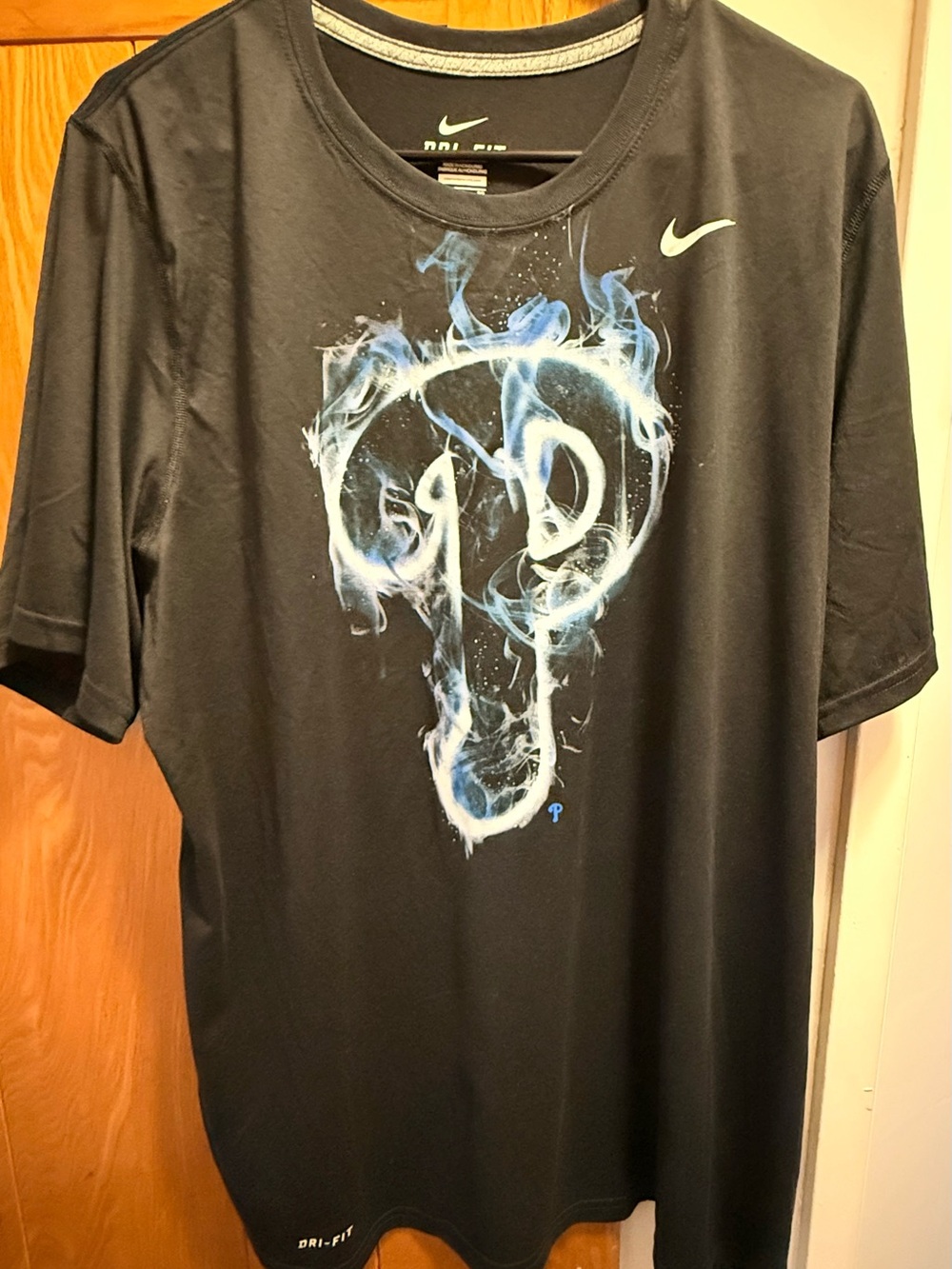 Nike Men’s Black Short-Sleeve Dri-FIT Tee with Phillies Blue Smoke Graphic